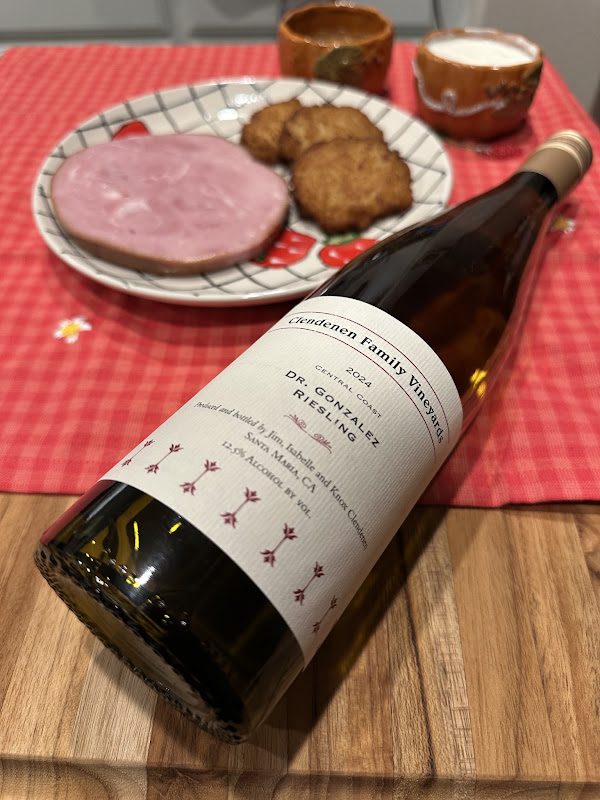Clendenen Family Vineyards 2024 Riesling paired with sliced holiday ham and golden potato latkes, served with applesauce and sour cream.